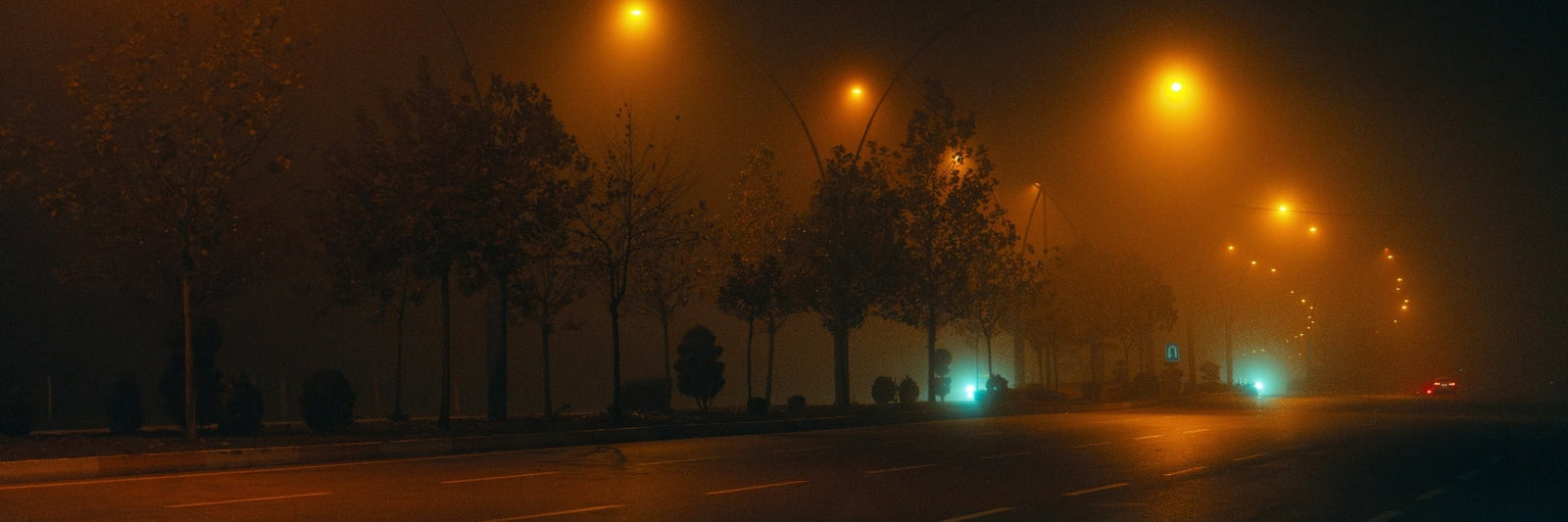 a view of an empty street at night