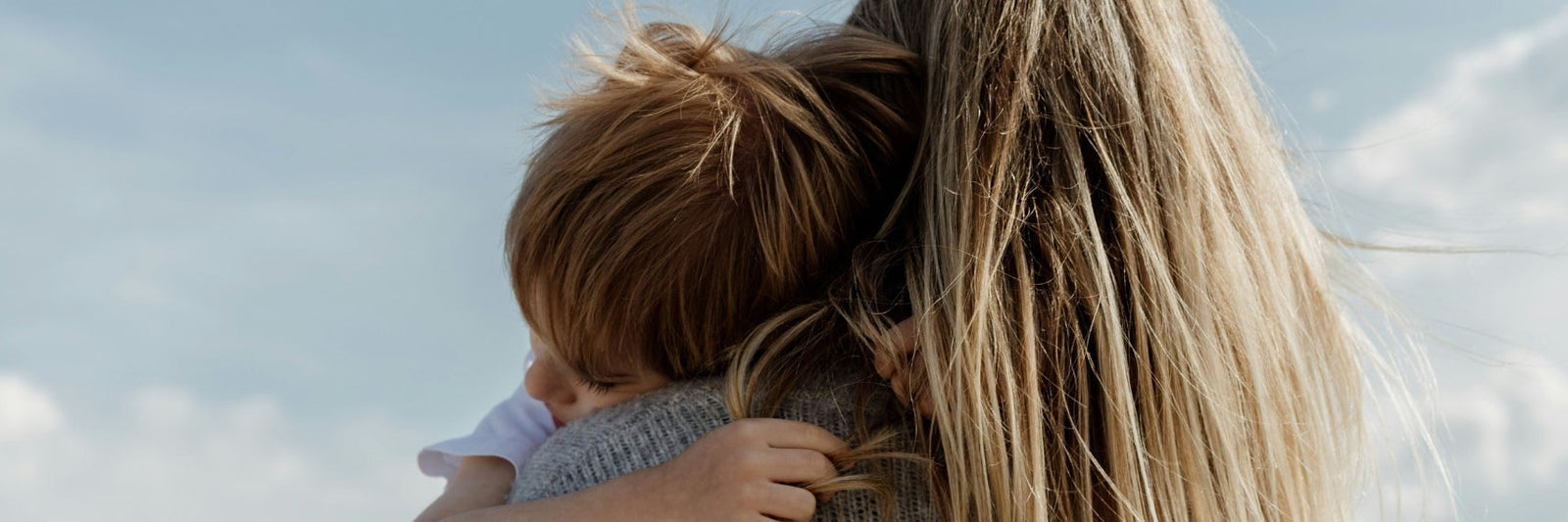 Mother hugging a child