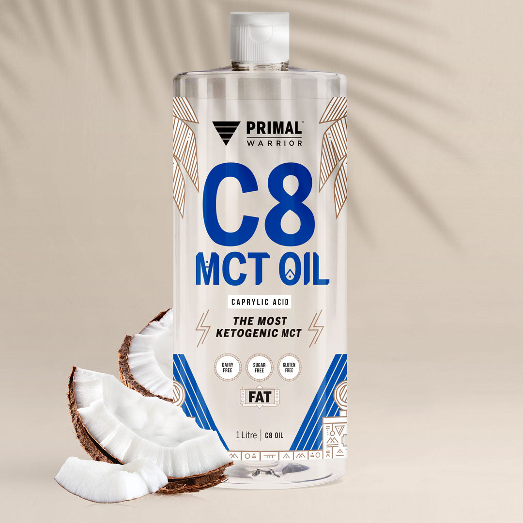 A bottle of Primal Warrior C8 MCT Oil 1 Litre, a dairy-free, vegan and keto-friendly fat sourced only from coconuts