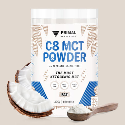 A canister of Primal Warrior C8 MCT Powder 300g, a keto and vegan coffee, matcha and hot cacao creamer