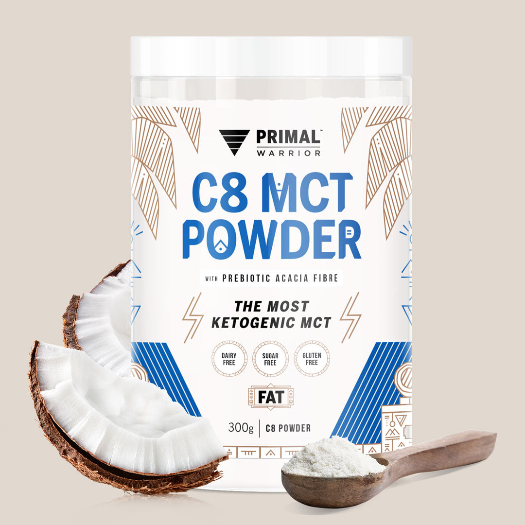 A canister of Primal Warrior C8 MCT Powder 300g, a keto and vegan coffee, matcha and hot cacao creamer
